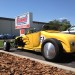 yellow hotrod with cobra in back thumbnail