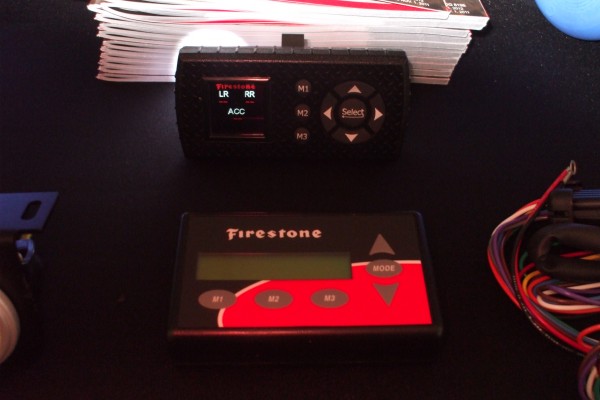 firestone suspension airbag controller display at automotive trade show