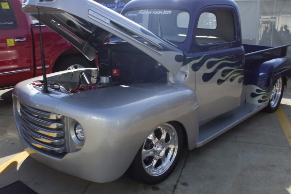 Classic Ford hot rod pickup truck with flames