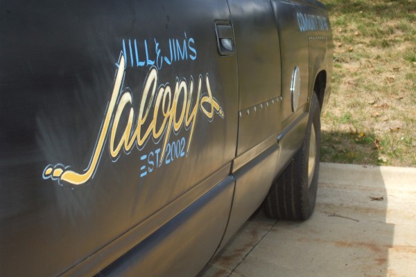 custom jalopy's paint job on a vintage pickup truck