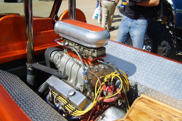 supercharged v8 in the back of a vintage drag race truck