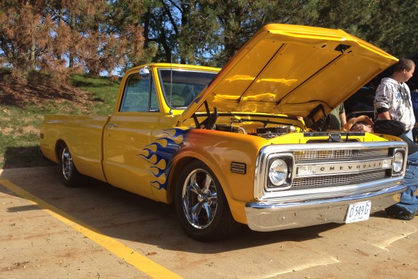 customized yellow hot rod chevy c10 pickup truck