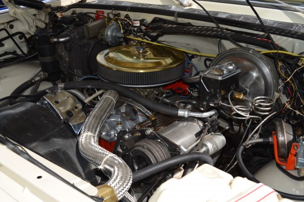 customized v8 engine in a vintage pickup truck