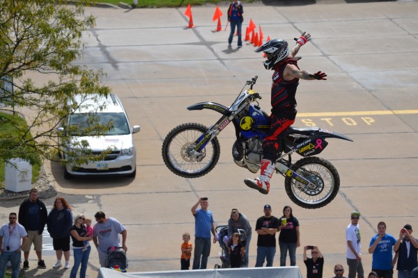 dirt bike rider doing a stunt during aerial exhibition
