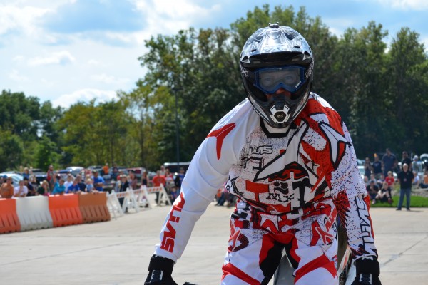 motocross rider looking at camera during dirt bike exhibition