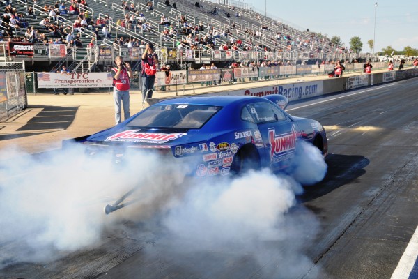 summit racing pro stock camaro doing a burnout before adrl race
