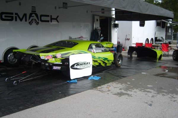 chevy camaro getting service din pits between drag races