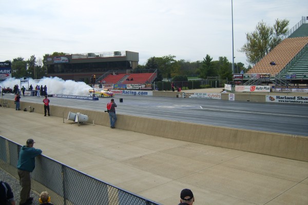dragster doing a burnout prior to drag race