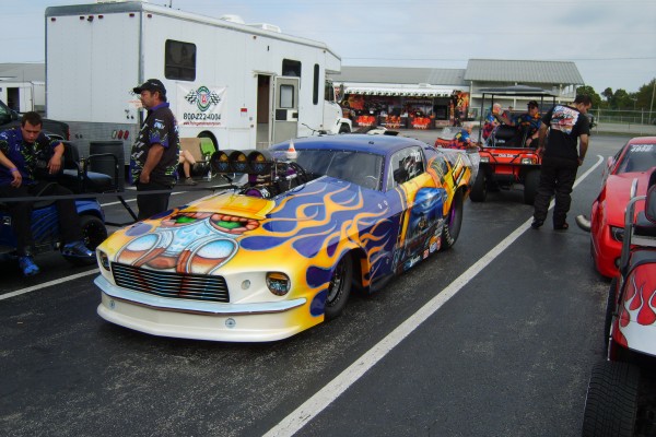 vintage mustang pro mod dragster in pits