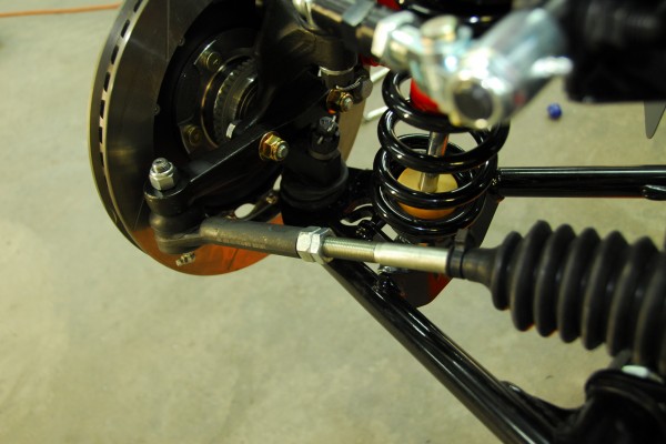 close up of tie rod and steering rack of a car