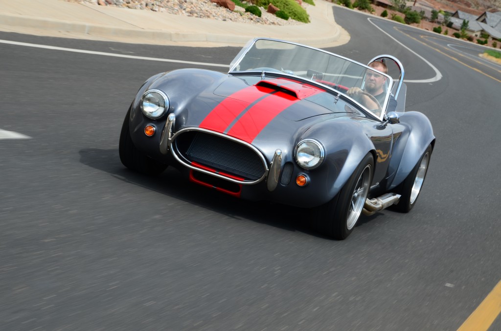 factory 5 mark 4 roadster driven on curving road