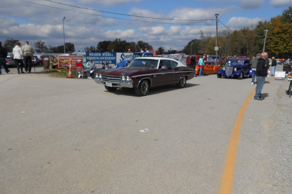 chevy chevelle entering a classic car show