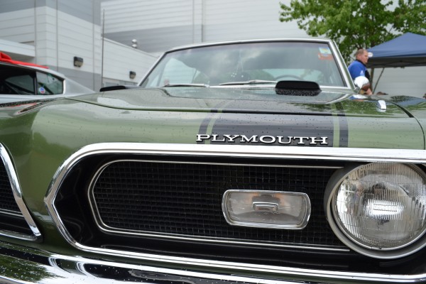 close up of plymouth grille emblem on a second gen barracuda