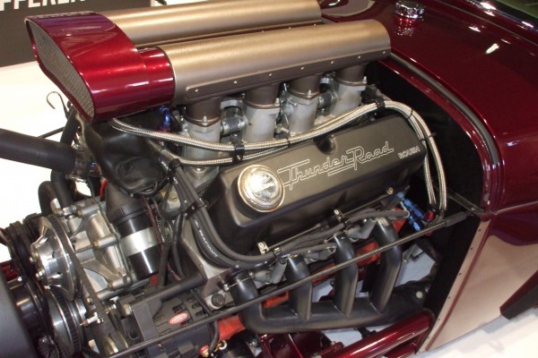 engine in a vintage hot rod at 2012 SEMA show
