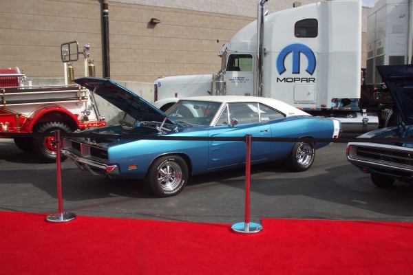 blue and white 1969 dodge charger on display at 2012 SEMA show