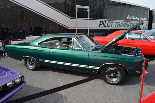 side view of a green plymouth gtx