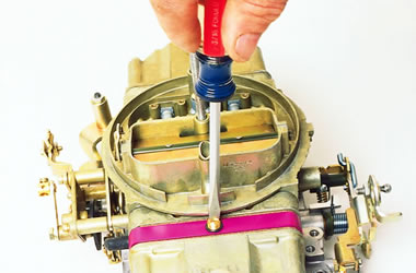 adjust-a-jet metering block installed on a holley carburetor