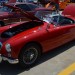vintage MG British roadster coupe at classic car show thumbnail