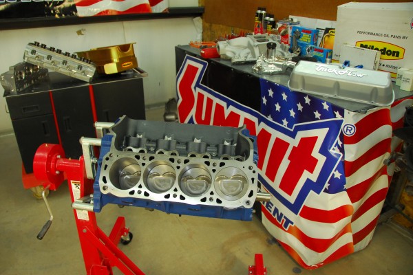 ford racing engine on a stand prior to assembly