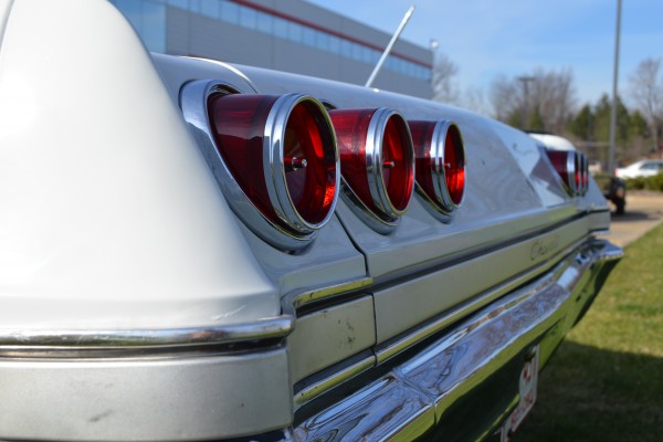 close up of round taillights on a 1965 chevy impala coupe