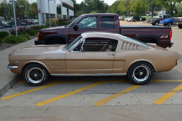 side view of a 1965 ford mustang fastback