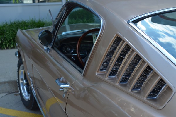 close up of louvers on a 1965 ford mustang fastback
