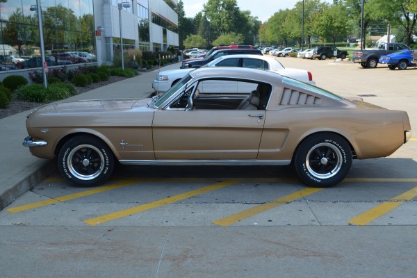 side profile view of a 1965 ford mustang fastback