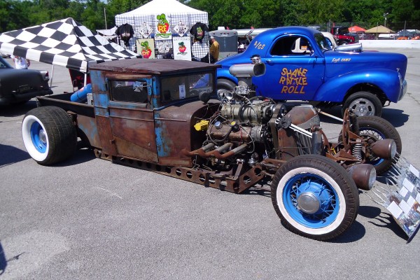 rat rod truck with supercharged v8 engine and custom frame