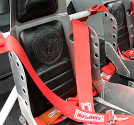 racing seats and harnesses in a muscle car restomod
