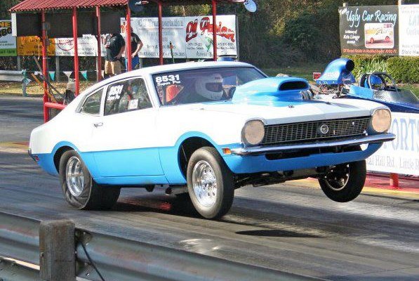 ford maverick drag car doing a wheelstand during launch