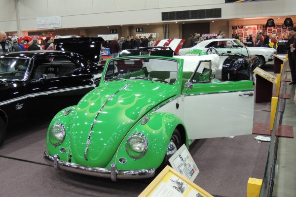 green customized Volkswagen beetle cabriolet