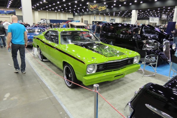 customized green plymouth duster muscle car