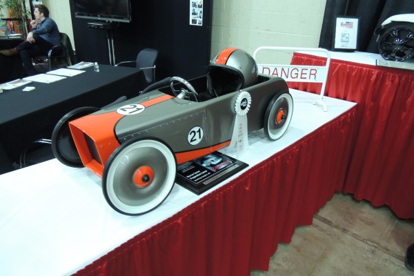 racer pedal car on display at car show
