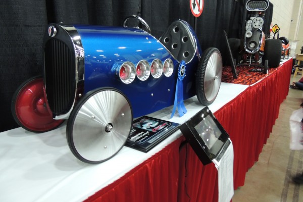 pedal car on display at car show