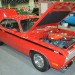 red plymouth duster 340 muscle car in a car show thumbnail