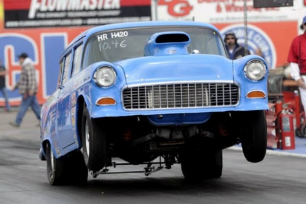 chevy nomad shell on a dragster doing a wheelstand