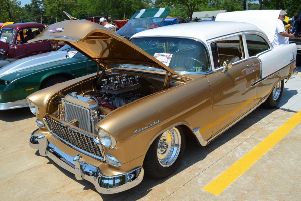 gold 1955 chevy post coupe