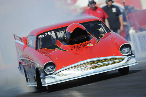 dragster with 1957 chevy body shell at strip