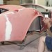 sanding fender edge bodywork on a classic car thumbnail