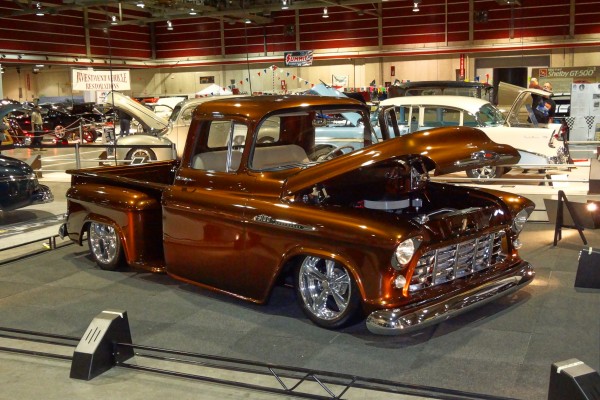 classic customized chevy pickup truck at a car show