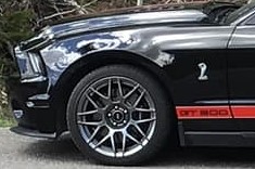 close up of alloy wheel on 2011 shelby gt500 mustang