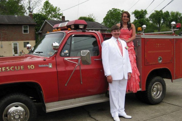1979 Chevrolet K30 fire truck with prom couple