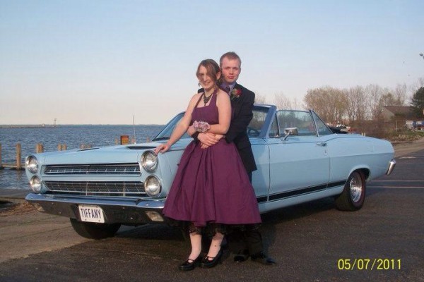 1966 Mercury Comet Cyclone with prom couple