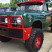 Lifted classic green truck thumbnail