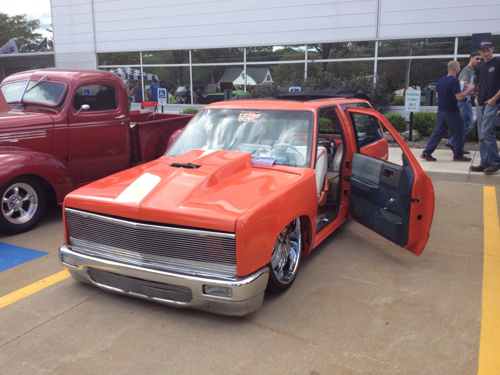 Lowered orange S10 Blazer with suicide doors