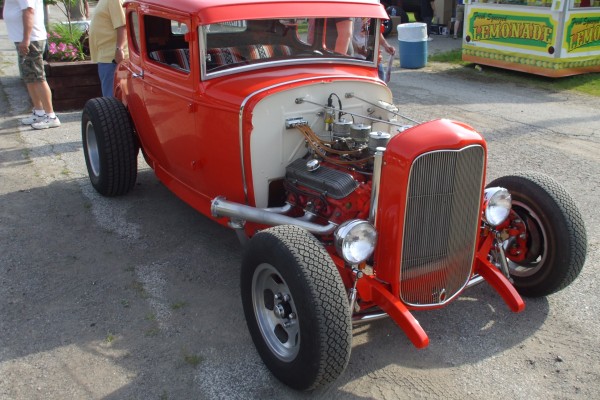 red ford five window hot rod with a v8