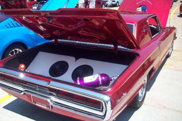 rear trunk of 1966 Ford Thunderbird with nitrous bottle