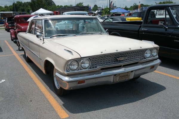 white ford fairlane coupe form the early 1960s