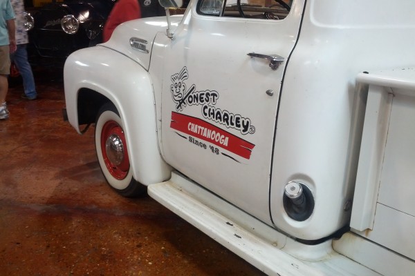 Honest charley graphic on the side of a vintage truck