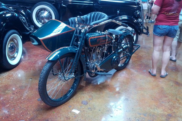 vintage sidecar motorcycle in a museum